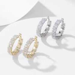 goud oorbellen met diamantlook