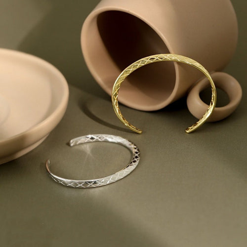 Unisex sterling zilveren armband met Möbius band ontwerp en ruitpatroon, verguld met 18-karaats goud