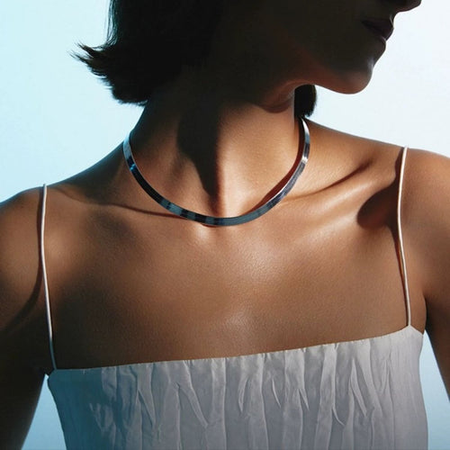 Visgraatketting in goudvermeil en sterling zilver, hypoallergene eigenschappen, verstelbare lengte voor een elegante uitstraling.