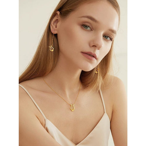 gouden harp ketting en oorbellen