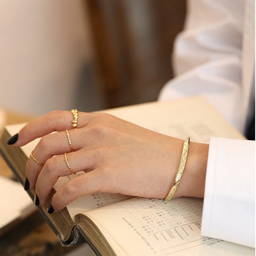 Möbius band armband van sterling zilver, verguld met 18-karaats goud, met ruitpatroon design