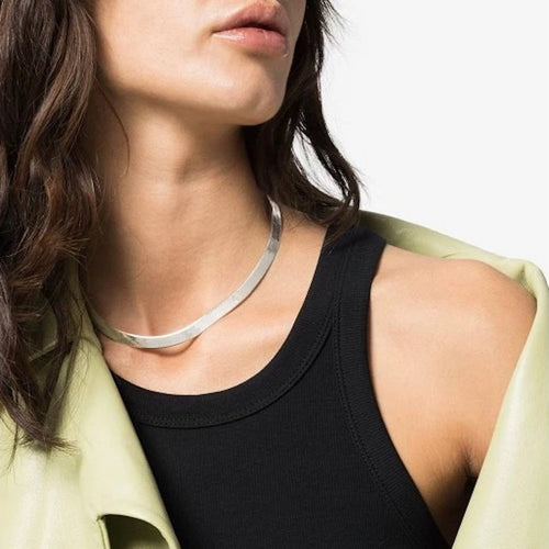 Elegante visgraatketting in goudvermeil en sterling zilver, verstelbare lengte en hypoallergene voor dagelijks gebruik.