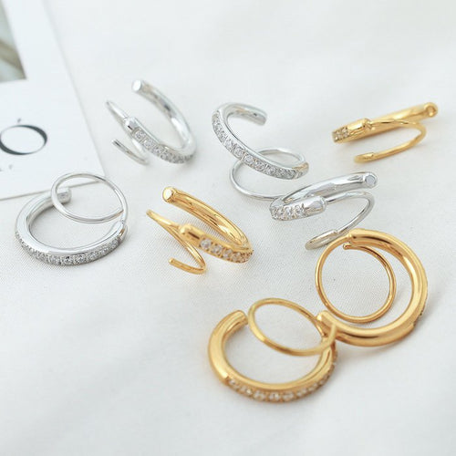goud zilver spiraal oorbel